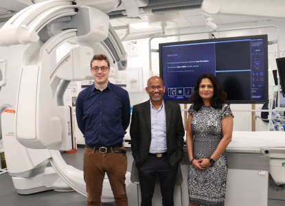 Interventional Radiology Fellow Dr Paul Jenkins, HPB & Transplant Consultant Surgeon Mr Somaiah Aroori and Consultant Interventional Radiologist Dr Nelofer Gafoor in a theatre in front of equipment