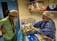 Staff carrying out surgical equipment audit