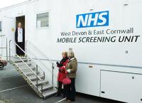 Image of patients outside of the mobile breast screening unit